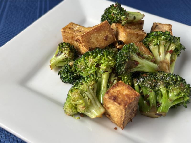 Tofu Broccoli recipe served on a white plate