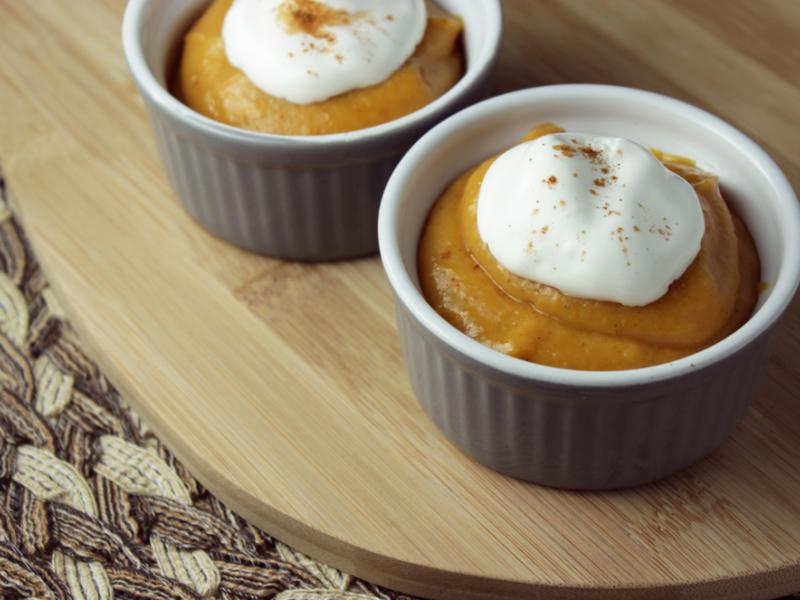 two servings of pumpkin pudding in white cups