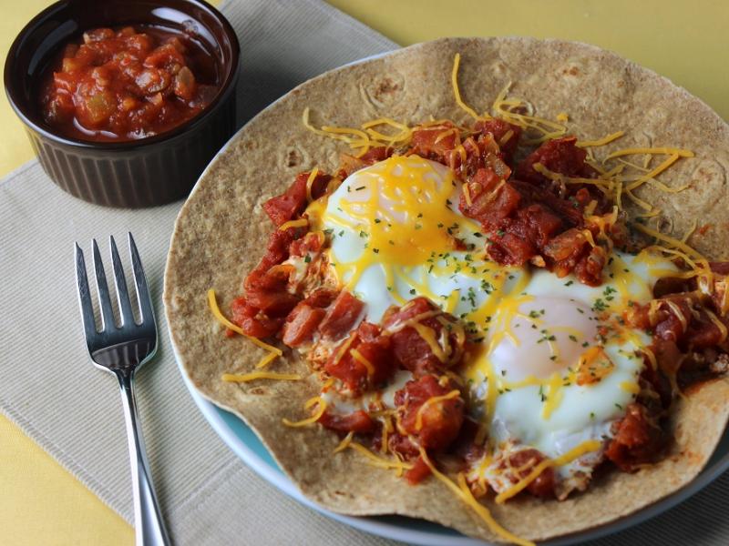 Huevos Rancheros served with a side of salsa