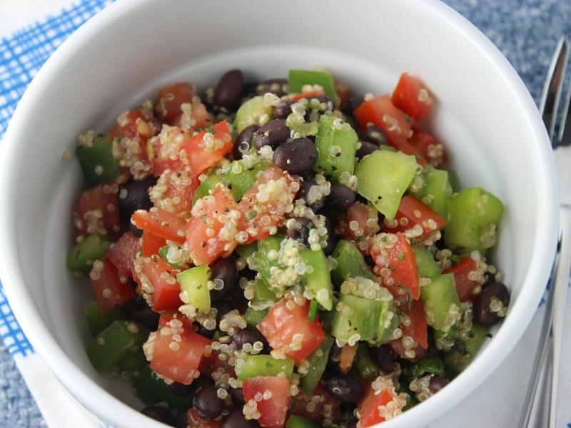 a serving of Quinoa and Black Bean Salad in a white dish