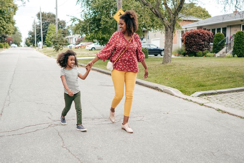 mom and daughter going for a walk